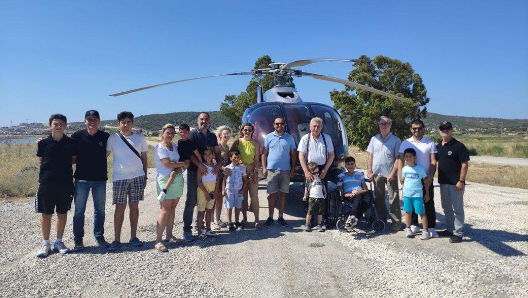  İzmir Havacılık Kulübü ve İlçe Milli Eğitim Müdürlüğü destekleriyle gerçekleştirilen etkinlikte engelli öğrencilerimiz ve aileleri helikopterle gezdiler.